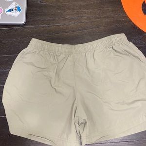 Women’s size medium nylon Columbia khaki shorts. Elastic waist.